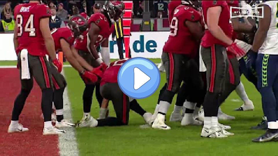 Play video: Tom Brady gets bumped on the head while taking a knee. Video thumb: Tom Brady gets bumped on the head while taking a knee.