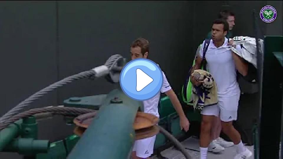 Play video: Tsonga helps injured Gasquet with his luggage. Video thumb: Tsonga helps injured Gasquet with his luggage.