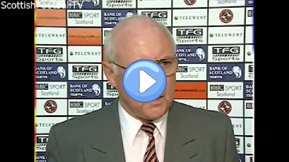 Play video: Jim McLean punches BBC reporter John Barnes. Video thumb: Jim McLean punches BBC reporter John Barnes.