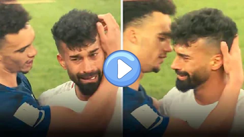 Play video: Antonee Robinson embraces the distraught Ramin Rezaeian at full-time. USA vs. Iran. Video thumb: Antonee Robinson embraces the distraught Ramin Rezaeian at full-time. USA vs. Iran.