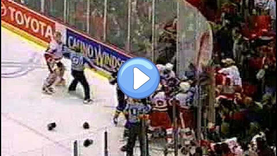 Play video: Hasek hit by Tkachuk. Video thumb: Hasek hit by Tkachuk.